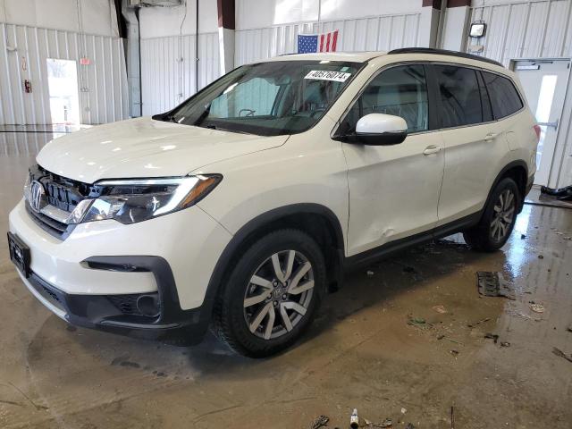 HONDA PILOT EXL 2019 with VIN 5FNYF6H50KB041592 - Photo from auction
