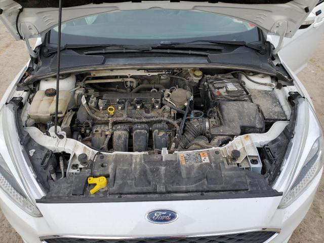 Photo 11 from auction – 2015 FORD FOCUS SE with VIN 1FADP3K21FL368732