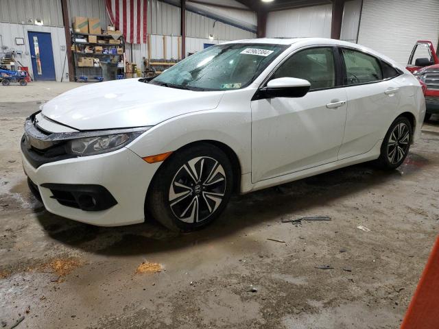 HONDA CIVIC EX 2018 with VIN JHMFC1F36JX039028 - Photo from auction
