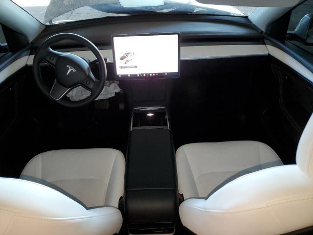 Photo 8 from auction – 2023 TESLA MODEL Y with VIN 7SAYGAEE3PF642820
