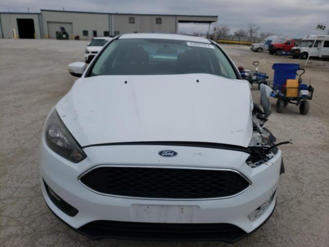 Photo 5 from auction – 2016 FORD FOCUS SE with VIN 1FADP3F20GL311854