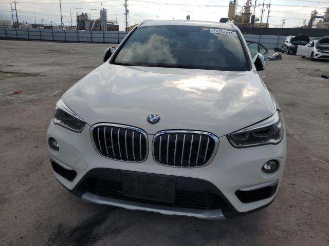 Photo 5 from auction – 2016 BMW X1 XDRIVE2 with VIN WBXHT3C3XG5E56219