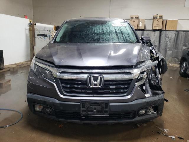 Photo 5 from auction – 2019 HONDA RIDGELINE with VIN 5FPYK3F51KB048037