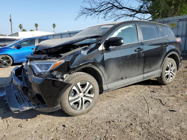 TOYOTA RAV4 LE 2018 with VIN 2T3ZFREV8JW484298 - Photo from auction