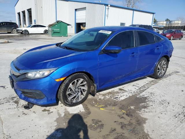 HONDA CIVIC EX 2018 with VIN 19XFC2F73JE027039 - Photo from auction