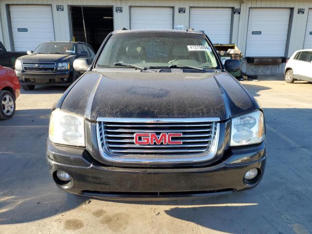 Photo 5 from auction – 2006 GMC ENVOY with VIN 1GKDT13SX62327079