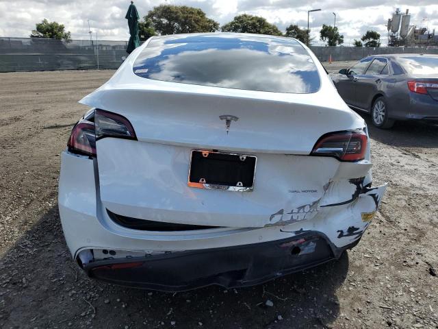 Photo 6 from auction – 2021 TESLA MODEL Y with VIN 5YJYGDEE0MF080661