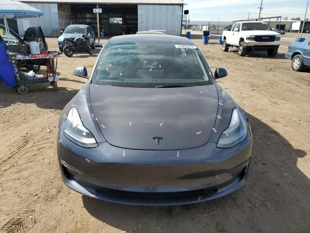 Photo 5 from auction – 2022 TESLA MODEL 3 with VIN 5YJ3E1EB1NF198403