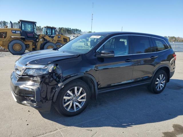HONDA PILOT EXL 2019 with VIN 5FNYF6H59KB069617 - Photo from auction