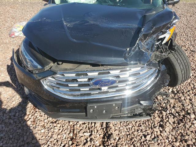 Photo 11 from auction – 2019 FORD EDGE TITAN with VIN 2FMPK4K93KBC03053