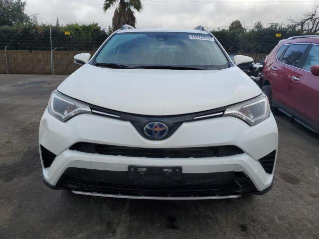 Photo 5 from auction – 2018 TOYOTA RAV4 HV LE with VIN JTMRJREV5JD257646