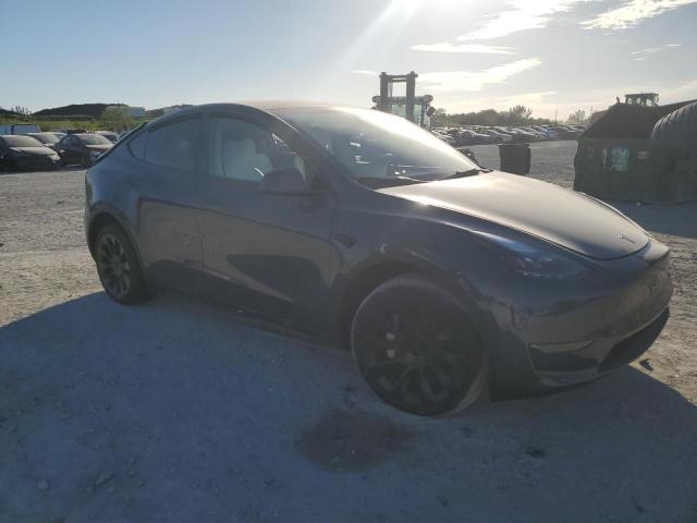 Photo 4 from auction – 2023 TESLA MODEL Y with VIN 7SAYGDEE0PA204917