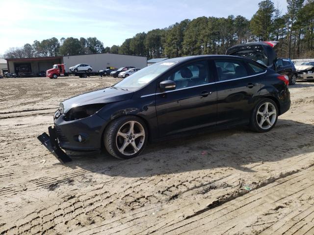 FORD FOCUS TITA 2014 with VIN 1FADP3J20EL457465 - Photo from auction