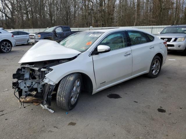 TOYOTA AVALON HYB 2014 with VIN 4T1BD1EB7EU021551 - Photo from auction