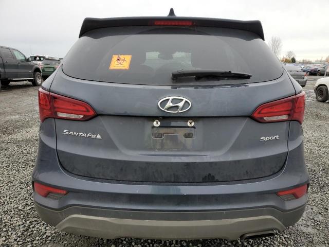 Photo 6 from auction – 2018 HYUNDAI SANTA FE S with VIN 5NMZU3LB7JH058280