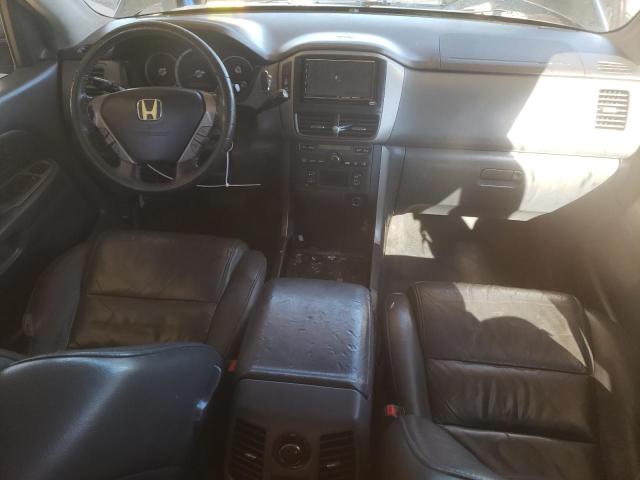 Photo 8 from auction – 2006 HONDA PILOT EX with VIN 2HKYF18556H559272