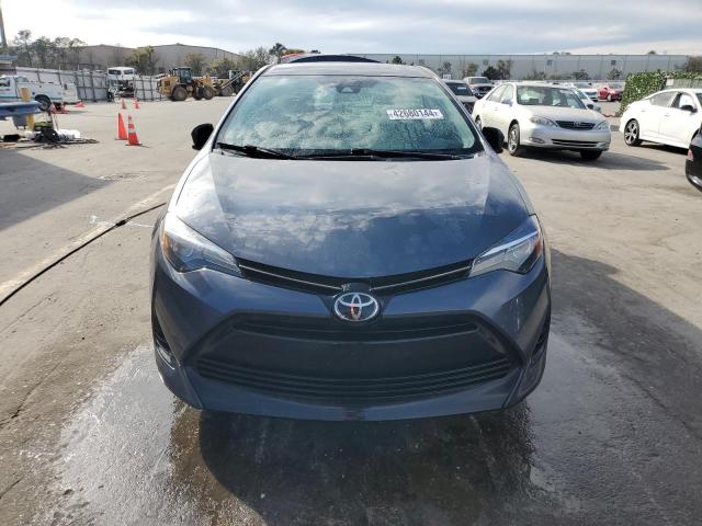 Photo 5 from auction – 2018 TOYOTA COROLLA L with VIN 5YFBURHEXJP752247