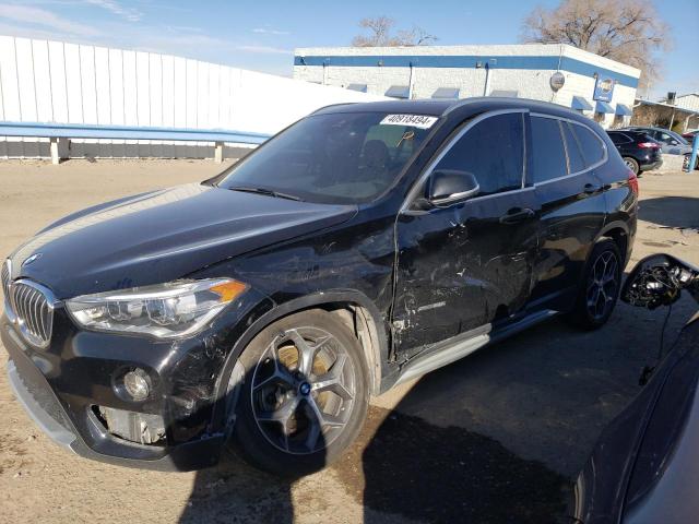 BMW X1 XDRIVE2 2017 with VIN WBXHT3Z31H4A65054 - Photo from auction