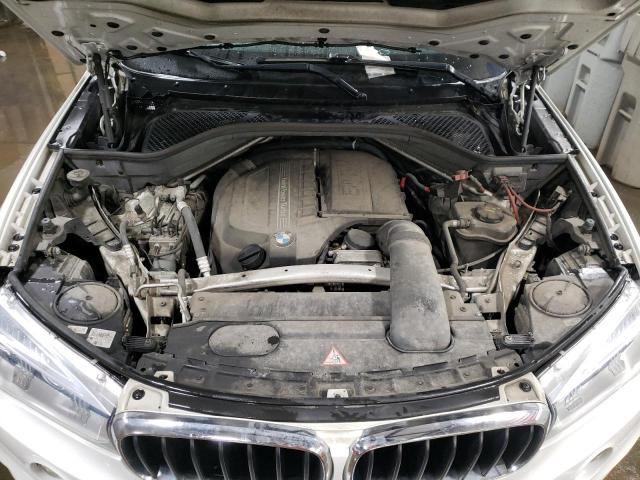 Photo 11 from auction – 2015 BMW X5 XDRIVE3 with VIN 5UXKR0C58F0P14469