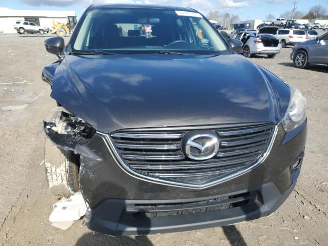 Photo 5 from auction – 2016 MAZDA CX-5 TOURI with VIN JM3KE4CY1G0774942