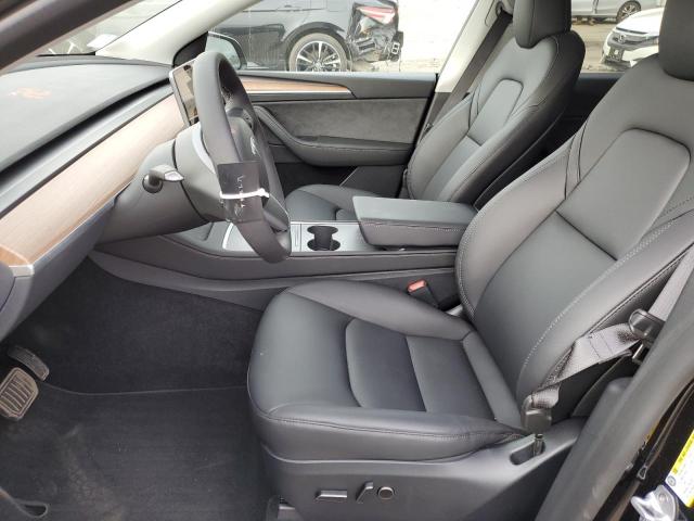 Photo 7 from auction – 2023 TESLA MODEL Y with VIN 7SAYGAEE9PF919843