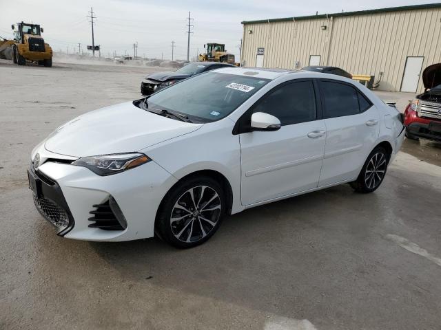 TOYOTA COROLLA L 2017 with VIN 5YFBURHE3HP583764 - Photo from auction