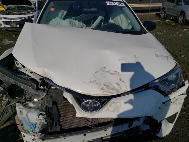 Photo 12 from auction – 2016 TOYOTA RAV4 LE with VIN JTMZFREV4GJ082608