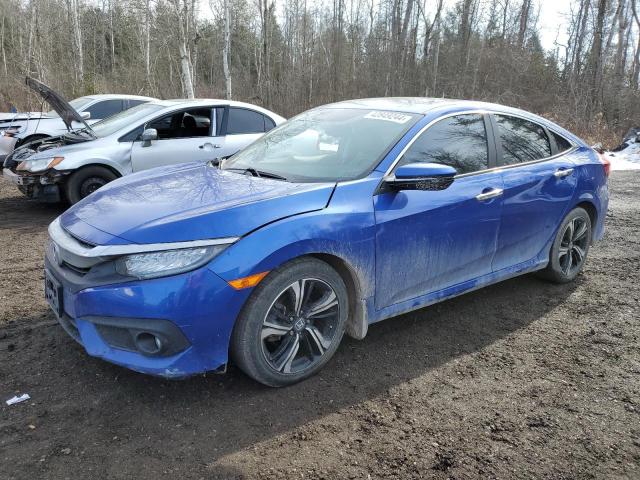 HONDA CIVIC TOUR 2018 with VIN 2HGFC1F96JH103340 - Photo from auction