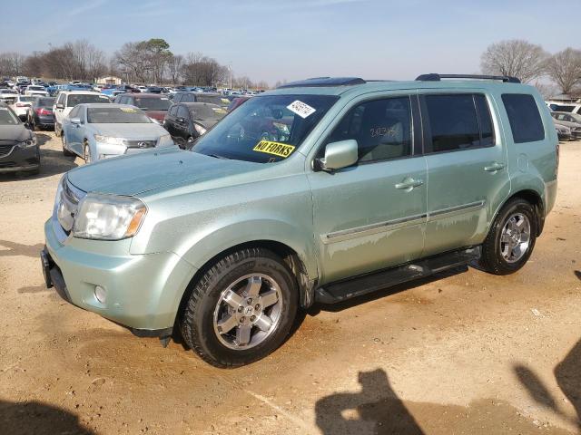 HONDA PILOT TOUR 2011 with VIN 5FNYF3H91BB052005 - Photo from auction