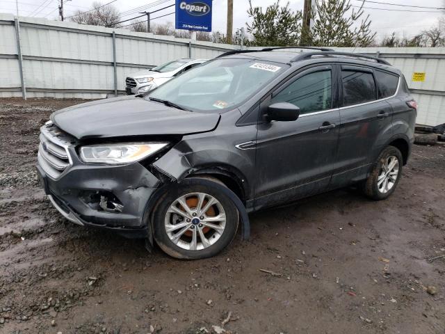 FORD ESCAPE SE 2017 with VIN 1FMCU9GD1HUF00649 - Photo from auction