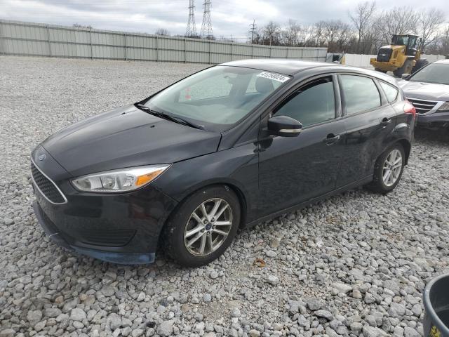 FORD FOCUS SE 2015 with VIN 1FADP3K21FL203375 - Photo from auction