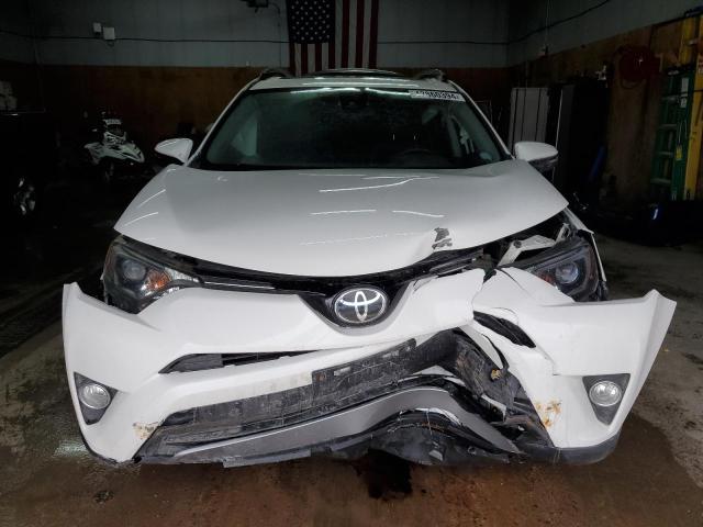 Photo 5 from auction – 2017 TOYOTA RAV4 XLE with VIN JTMRFREV5HJ174215