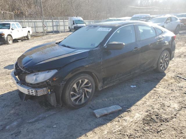 Photo 1 from auction – 2018 HONDA CIVIC EX with VIN 19XFC2F76JE021834