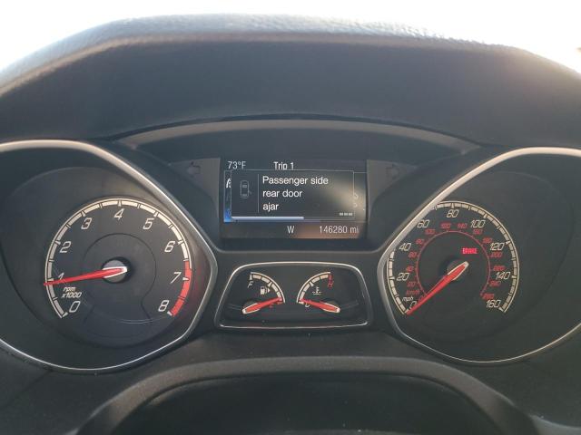 Photo 9 from auction – 2014 FORD FOCUS with VIN 1FADP3L97EL202936