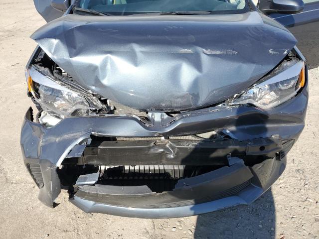 Photo 11 from auction – 2014 TOYOTA COROLLA L with VIN 2T1BURHEXEC174799