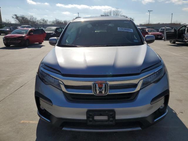 Photo 5 from auction – 2021 HONDA PILOT TOUR with VIN 5FNYF6H9XMB033280