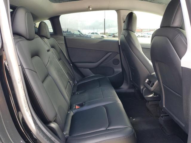 Photo 11 from auction – 2022 TESLA MODEL Y with VIN 7SAYGDEF5NF326679