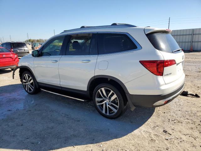 Photo 2 from auction – 2017 HONDA PILOT ELIT with VIN 5FNYF6H04HB027353