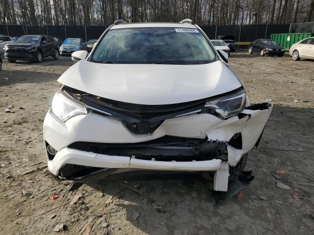 Photo 5 from auction – 2017 TOYOTA RAV4 XLE with VIN JTMRFREV8HJ707593