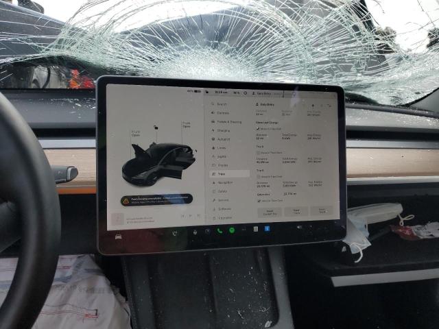 Photo 9 from auction – 2022 TESLA MODEL 3 with VIN 5YJ3E1EBXNF129788