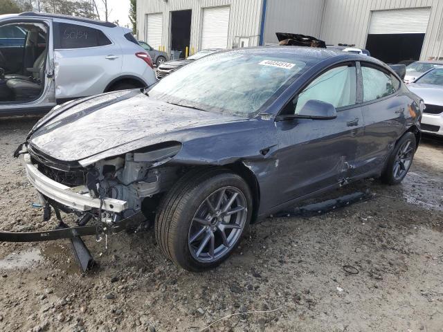 TESLA MODEL 3 2023 with VIN 5YJ3E1EAXPF705745 - Photo from auction