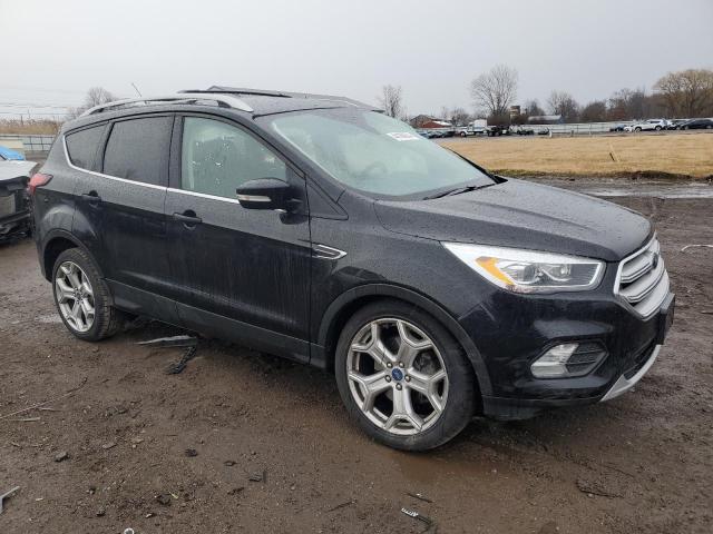 Photo 4 from auction – 2019 FORD ESCAPE TIT with VIN 1FMCU9J91KUA55809
