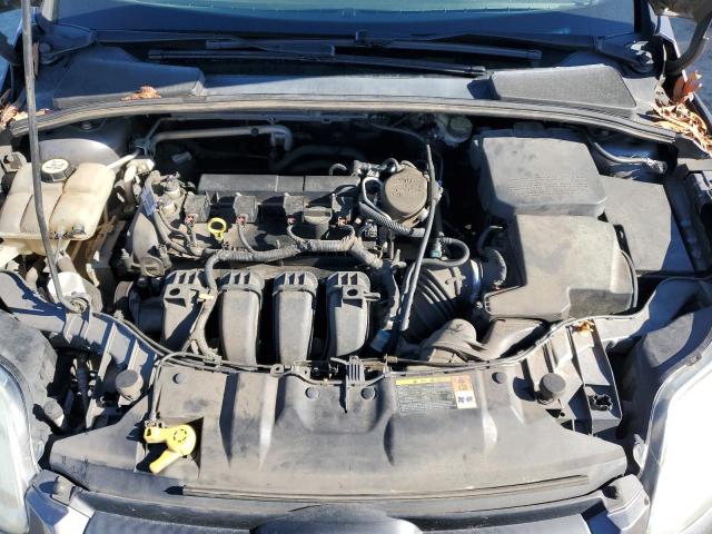 Photo 11 from auction – 2013 FORD FOCUS SE with VIN 1FADP3F21DL271960