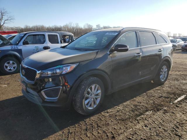 KIA SORENTO LX 2016 with VIN 5XYPG4A30GG061878 - Photo from auction
