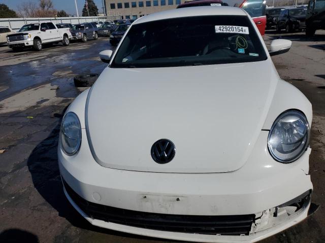 Photo 5 from auction – 2014 VOLKSWAGEN BEETLE with VIN 3VWJX7AT2EM616544