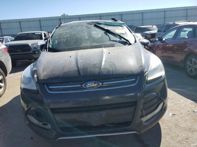 Photo 5 from auction – 2014 FORD ESCAPE TIT with VIN 1FMCU9J97EUB46376