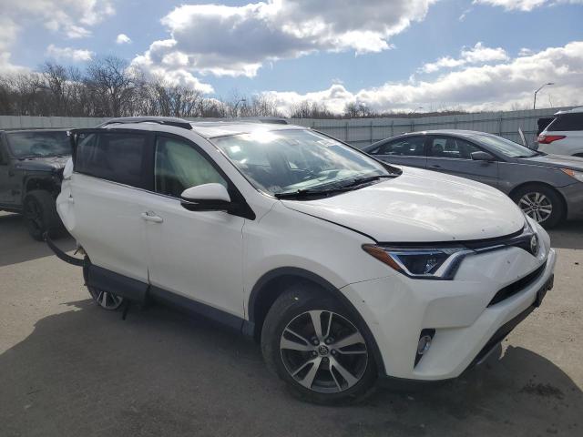 Photo 4 from auction – 2017 TOYOTA RAV4 XLE with VIN JTMRFREV8HJ130077