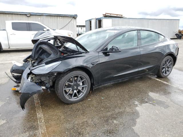 TESLA MODEL 3 2022 with VIN 5YJ3E1EBXNF137843 - Photo from auction