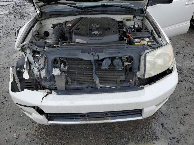 Photo 11 from auction – 2004 TOYOTA 4RUNNER SR with VIN JTEBU14R448020833