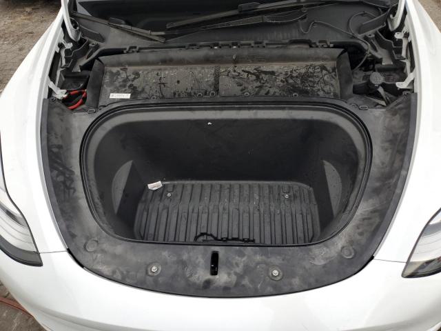 Photo 11 from auction – 2022 TESLA MODEL Y with VIN 7SAYGDEEXNA022753